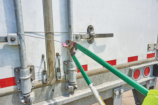 Criminals can beat cargo security via brute-force physical tampering, cutting through hardware. J. J. Keller & Associates image.